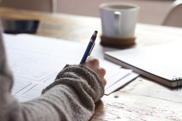 person making notes